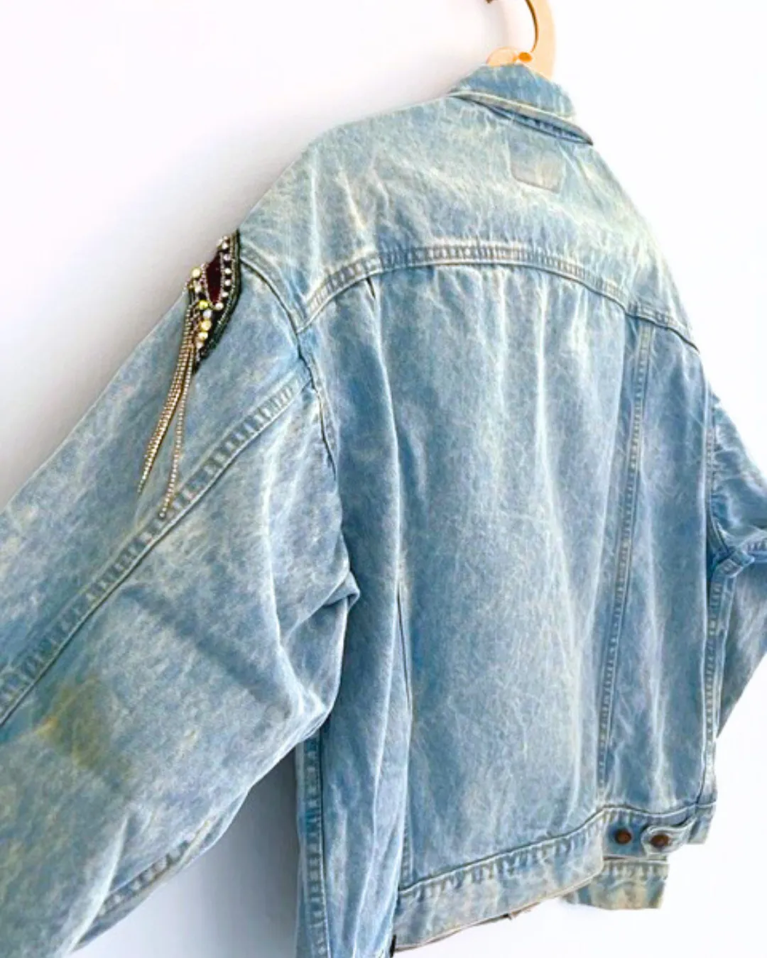 Vintage LEVI bleached denim jacket with crystal and chain shoulder embellishment