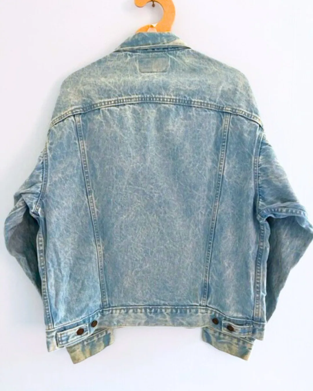 Vintage LEVI bleached denim jacket with crystal and chain shoulder embellishment